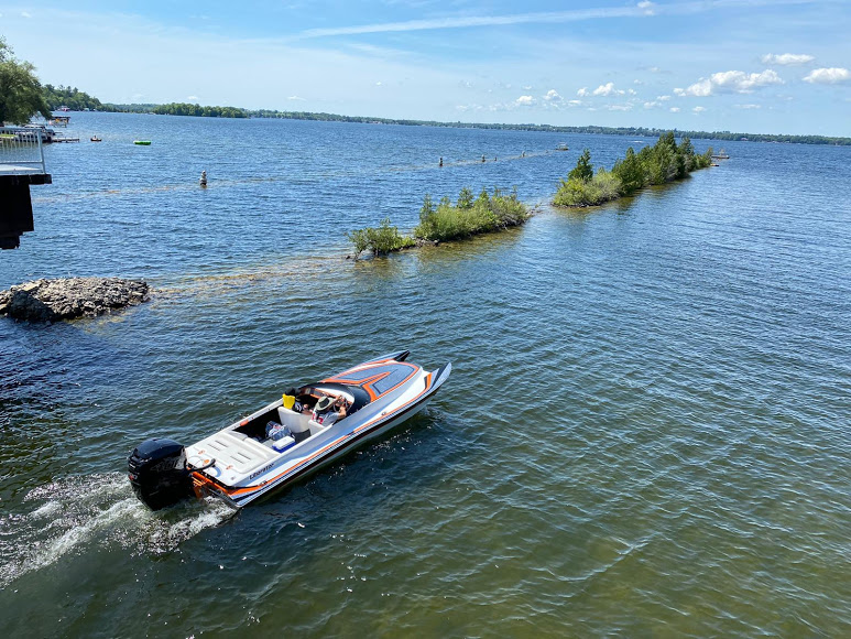 photo of a speed boat on Cameron Lake in the Kawarthas.